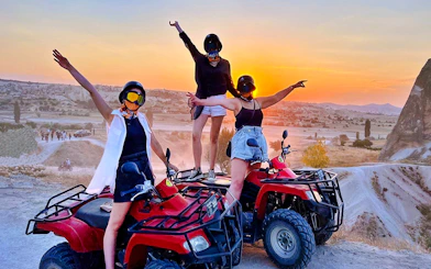 Guests on ATVs enjoying a sunset tour in Cappadocia.