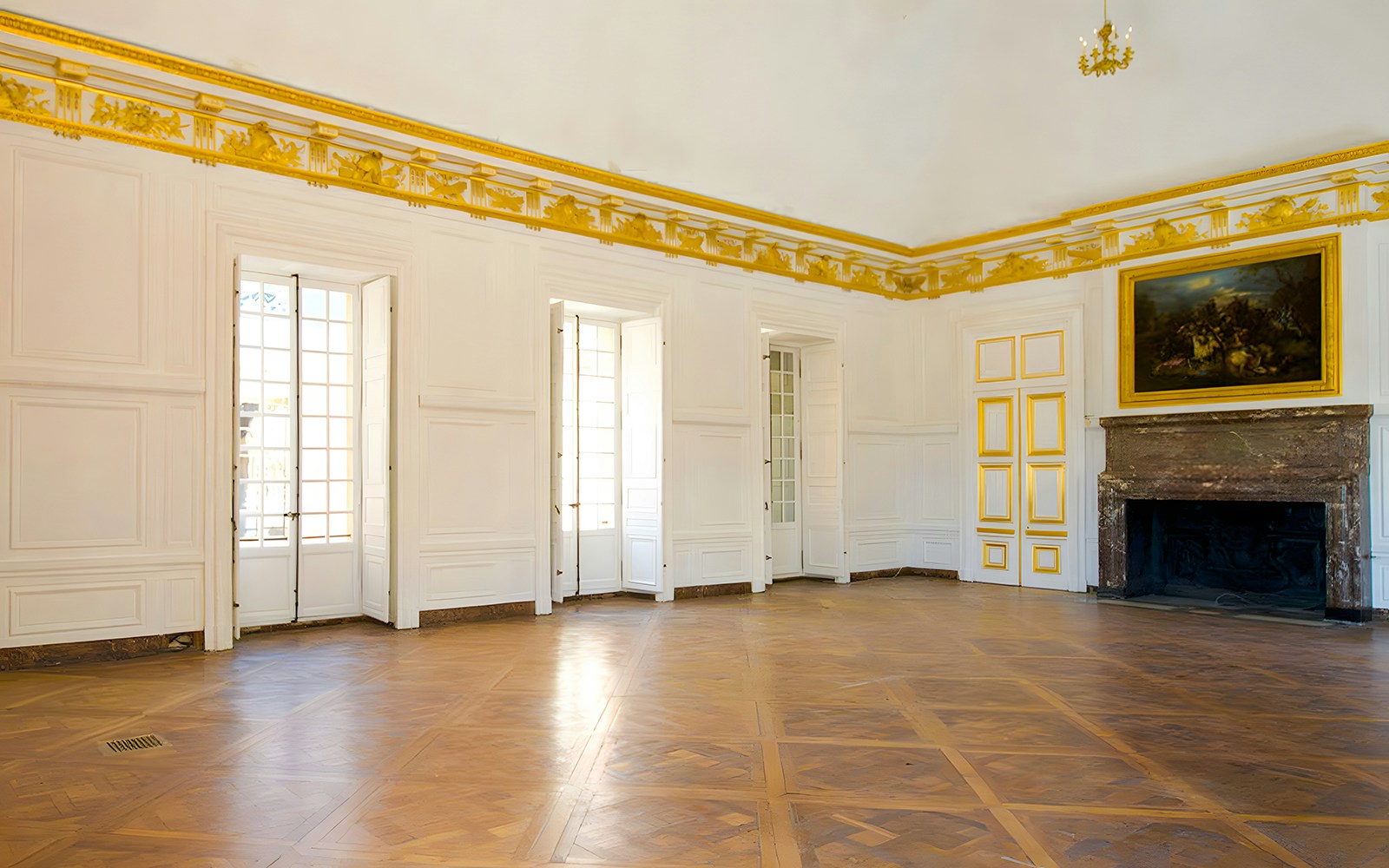 Kings Guard Room in Versailles Palace with ornate decor and historical artifacts.