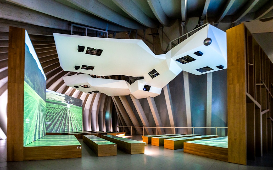 Cité du Vin museum interior with vineyard projections, Bordeaux, France.