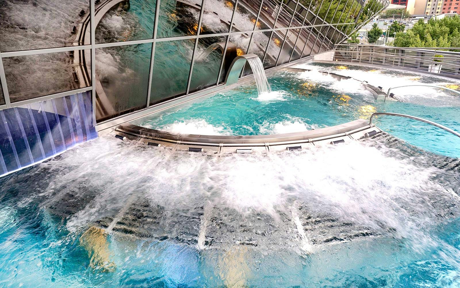 Caldea spa complex with thermal pools in Andorra, view of modern architecture.