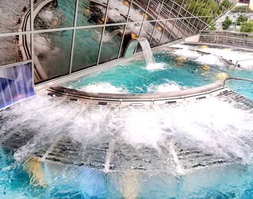Caldea spa complex with thermal pools in Andorra, view of modern architecture.