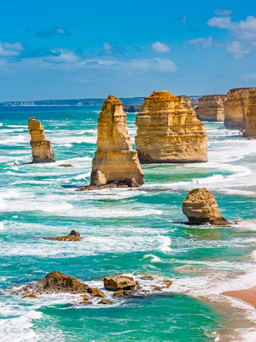 Great Ocean Road coastline view with winding road and ocean, Melbourne, Australia.