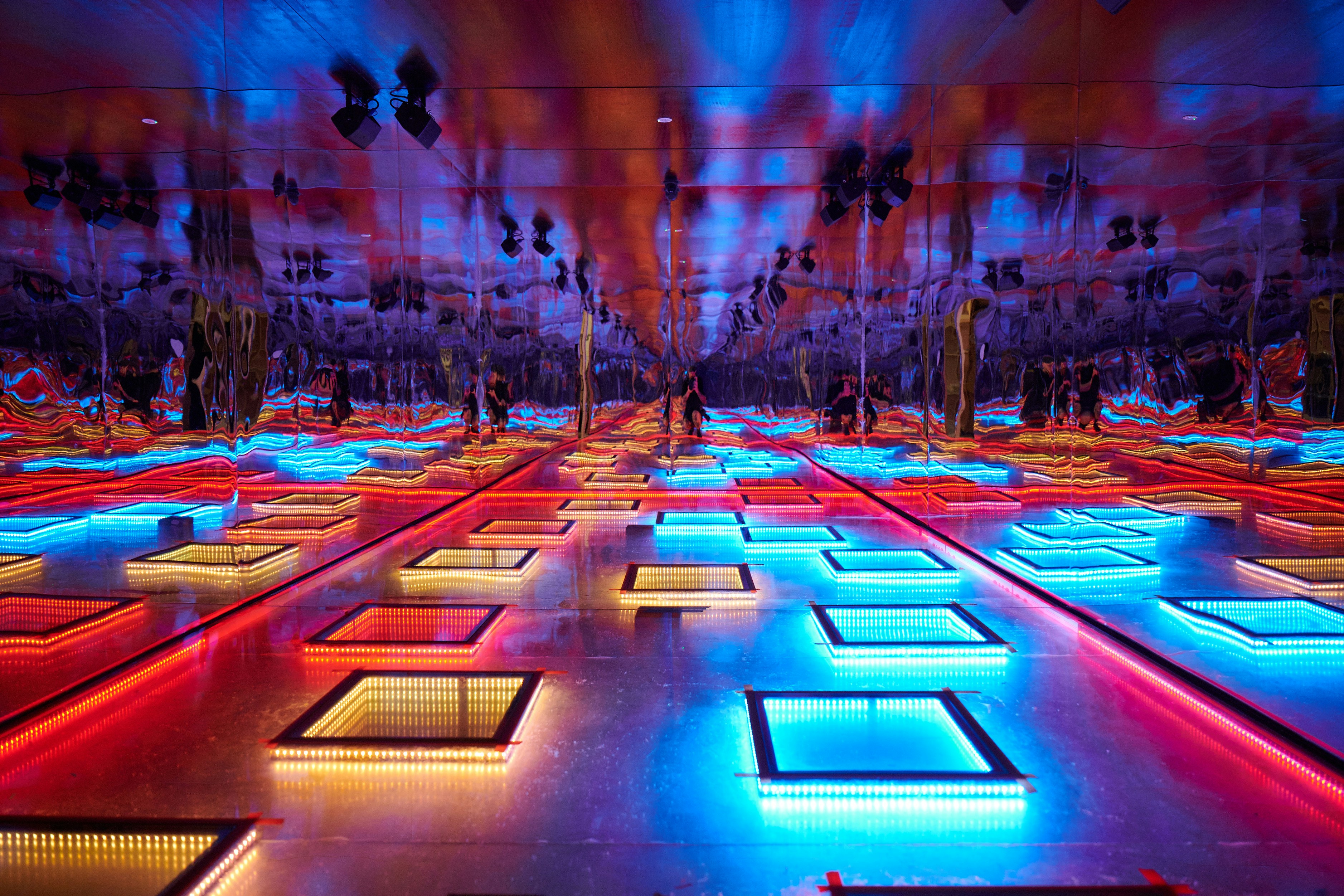 Chromadance room with colorful LED floor panels at Dopamine Land.