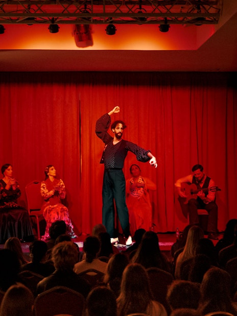 Flamenco dancers performing on stage at Laietana, Barcelona.