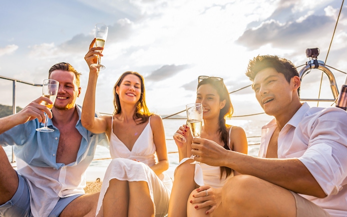 Group enjoying wine tasting on a boat tour in Favignana.