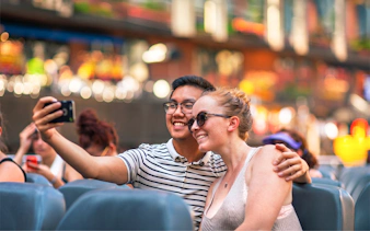 Couple taking a selfie on the Chicago Sea Dog Fireworks Cruise on Lake Michigan.