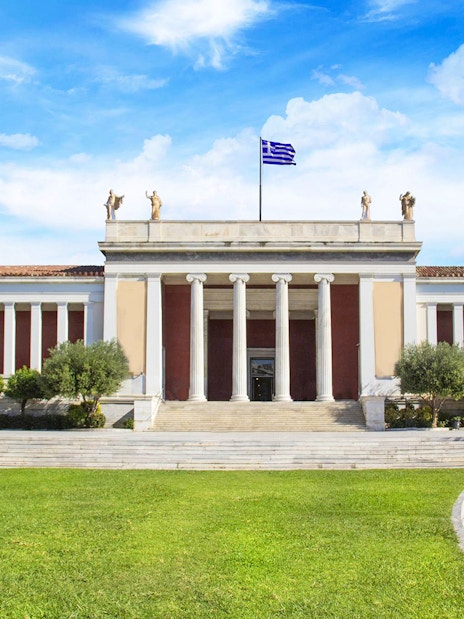 National Archaeological Museum facade with neoclassical columns in Athens, Greece.