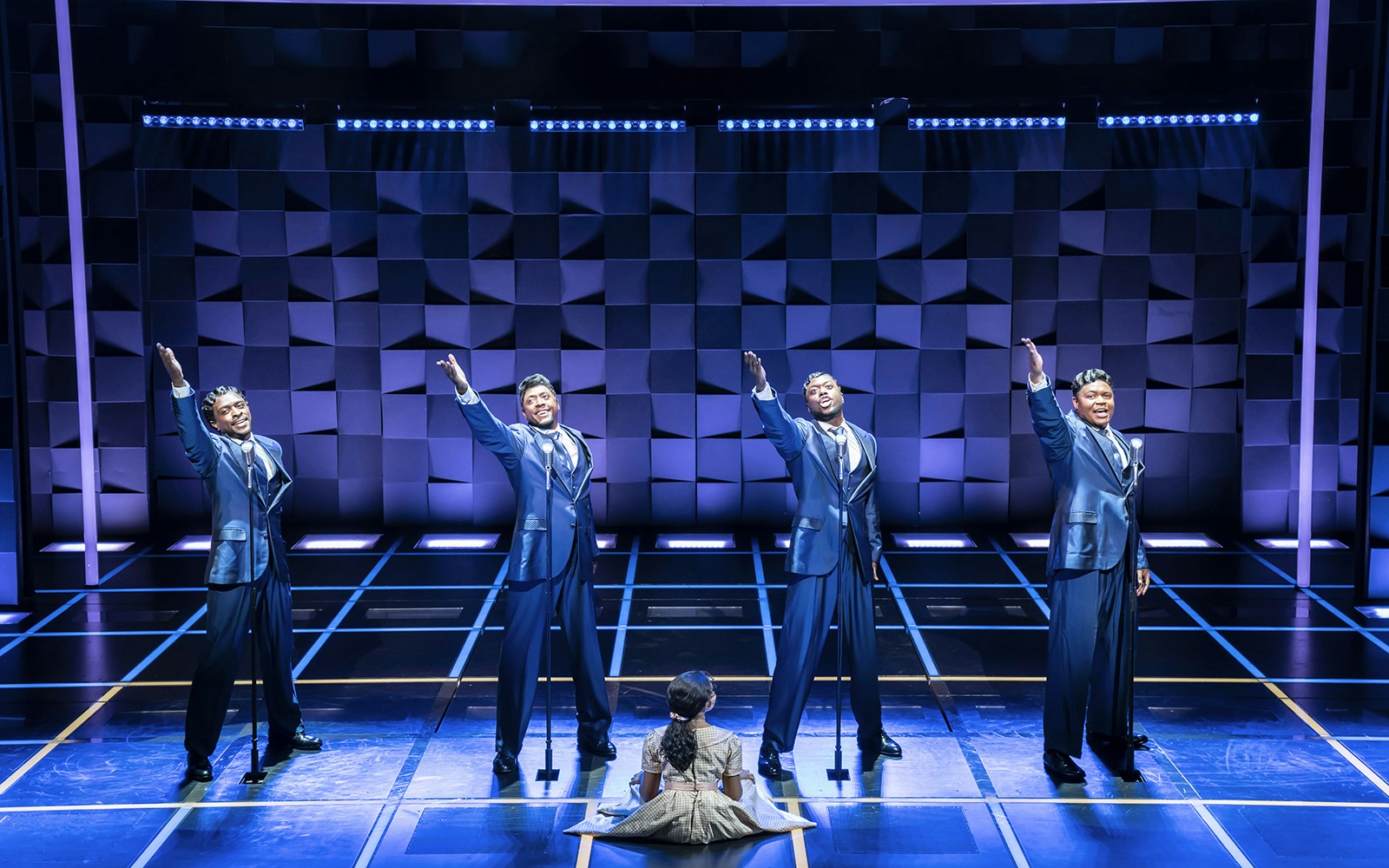 Performers on stage during "The Drifters Girl" musical.