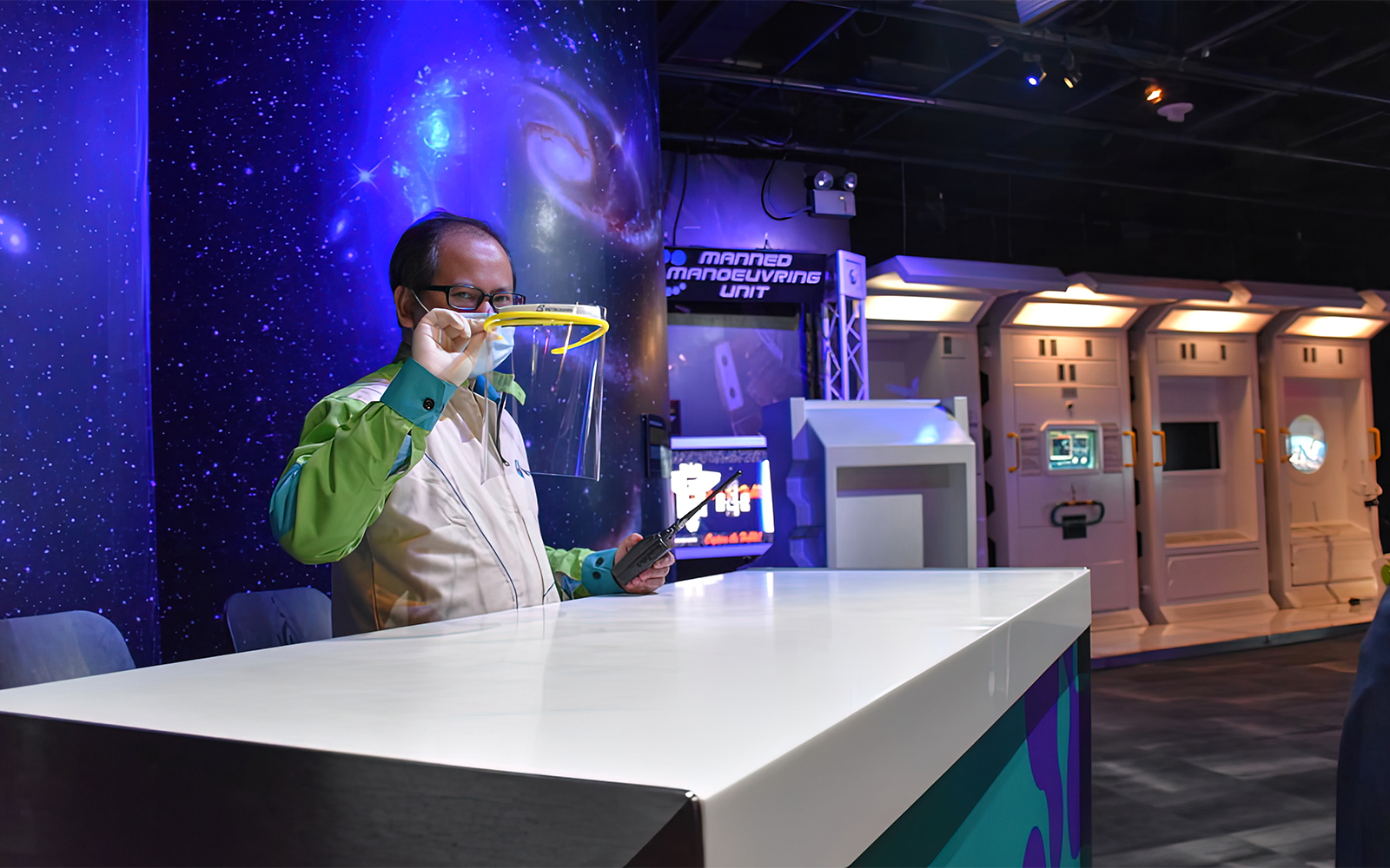 Petrosains staff demonstrating science exhibit in Kuala Lumpur.