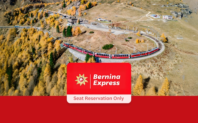 Bernina Express train winding through autumn landscape near Tirano and St. Moritz.