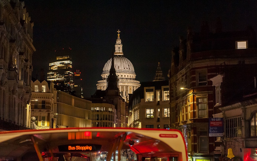 London night view from Tootbus with St. Paul's Cathedral in the background.