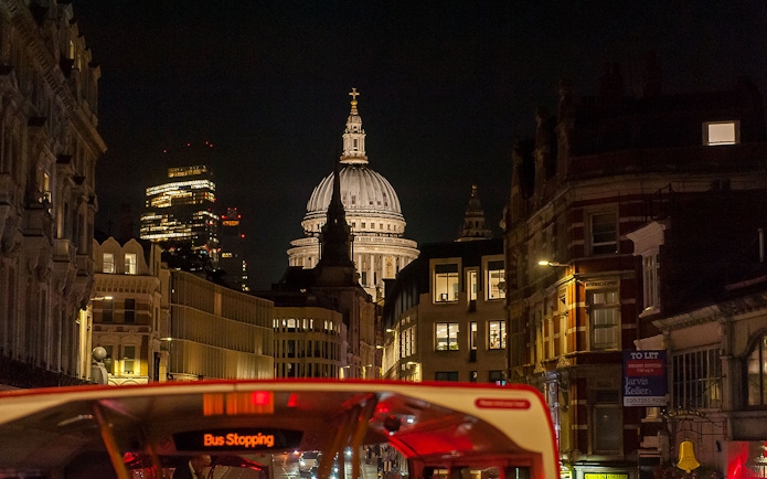 London night view from Tootbus with St. Paul's Cathedral in the background.