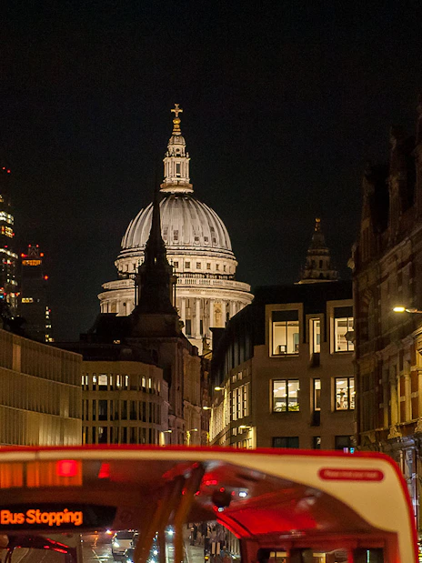 London night view from Tootbus with St. Paul's Cathedral in the background.