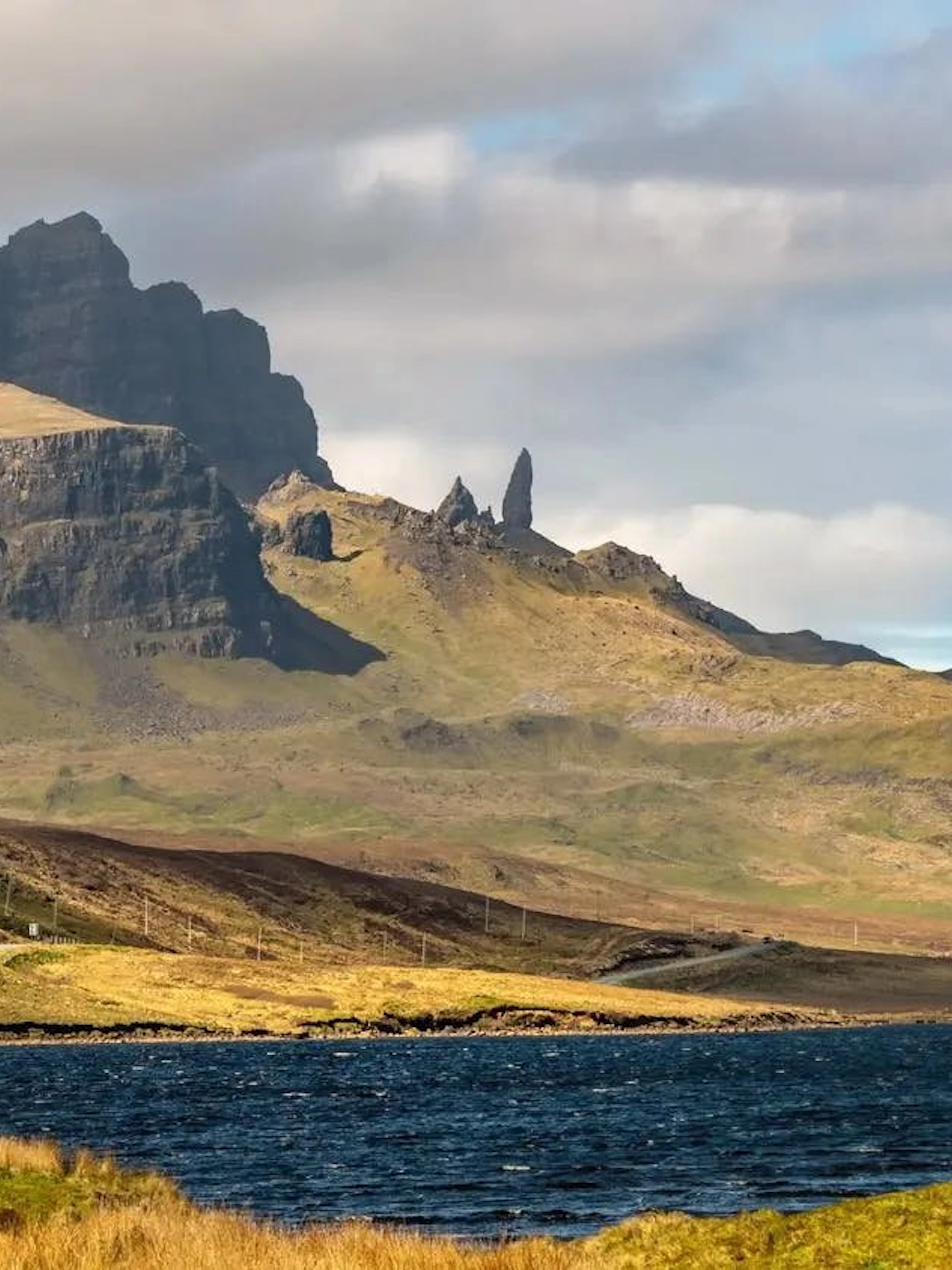 Loch Leathan with the Old Man of Storr rock formation in the background, Isle of Skye, Scotland.