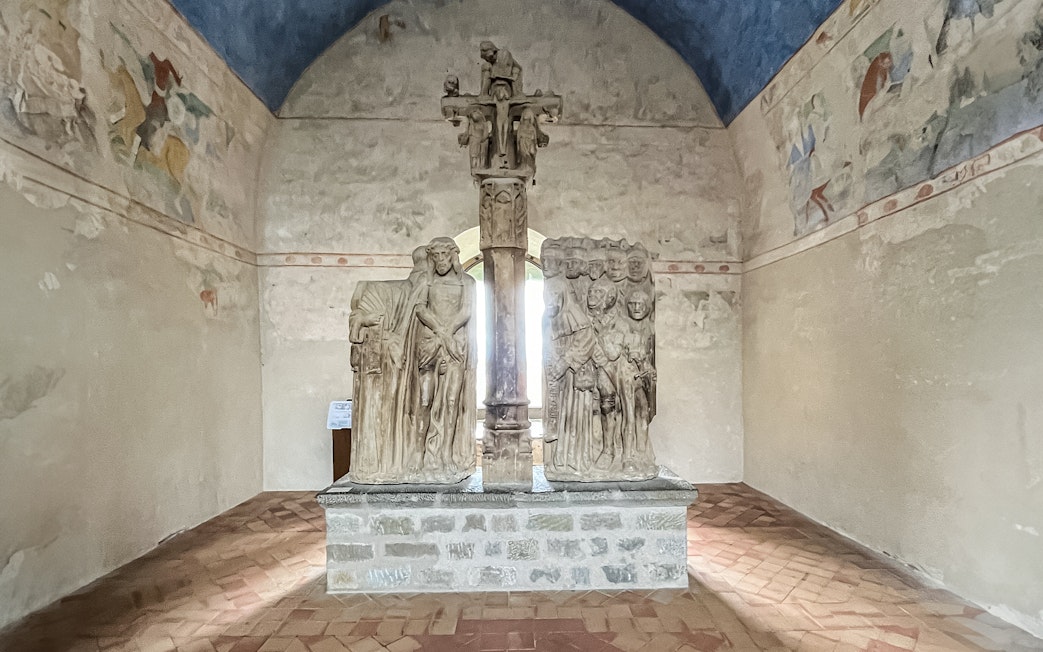 Stone sculptures inside Carcassonne Castle chapel, France.