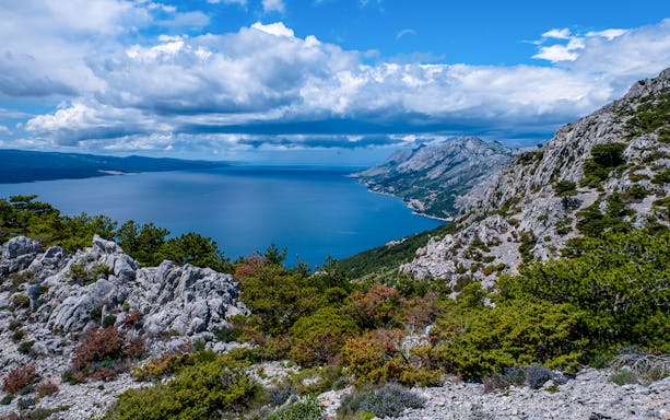 View of Biokovo mountain range and Adriatic Sea from Makarska, Croatia.