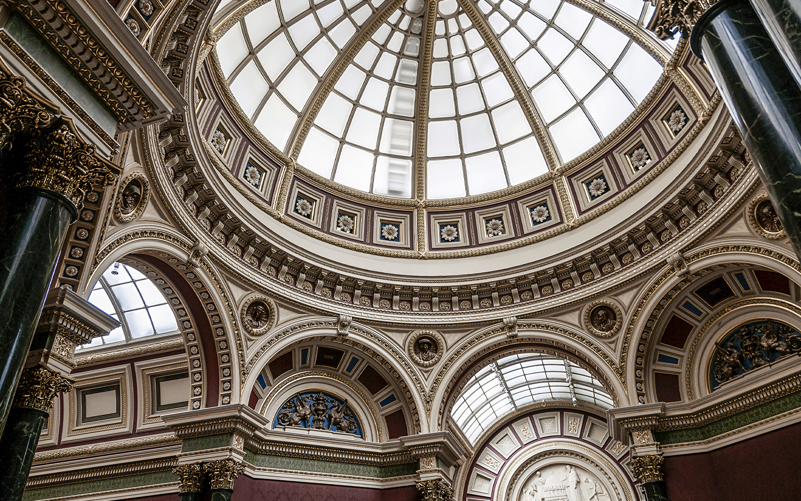 National Gallery London dome interior with visitors on a guided tour.