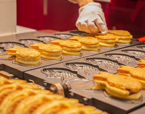 Grilling taiyaki in Tokyo, Japan.
