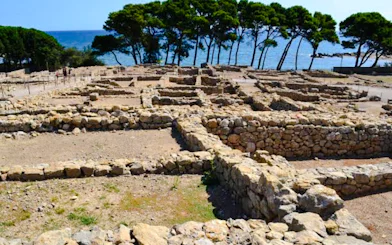 Ruins of ancient Greek and Roman cities at Empúries with sea view, Girona.