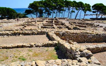 Ruins of ancient Greek and Roman cities at Empúries with sea view, Girona.