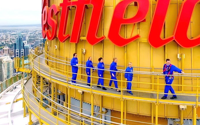 Visitors walking on the Sydney Tower Eye observation deck.