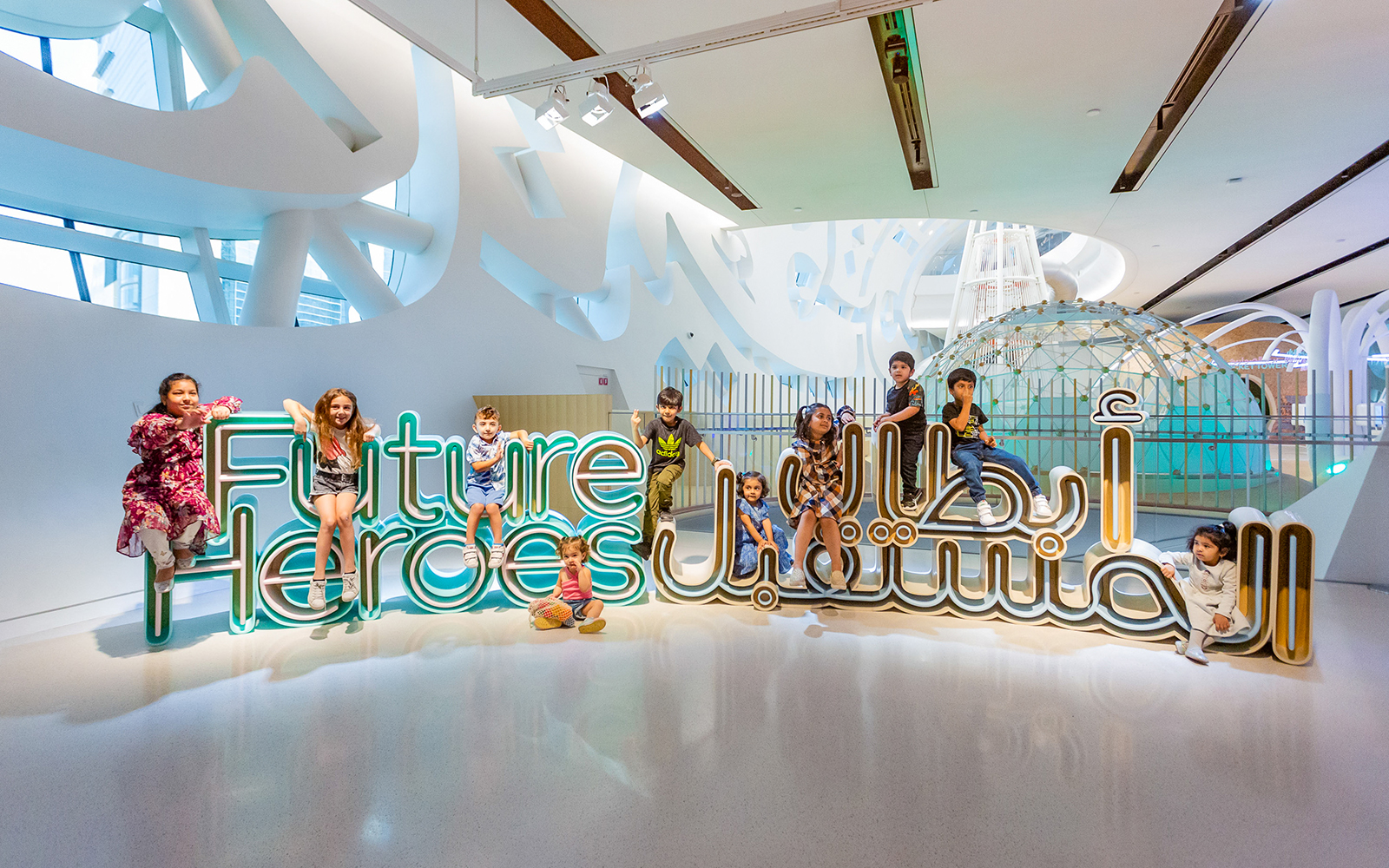 Children enjoying the Future Heroes exhibit at the Museum of the Future, Dubai.