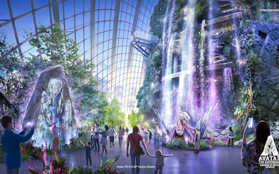 Visitors exploring the Avatar-themed Cloud Forest with waterfalls and lush greenery in Singapore.