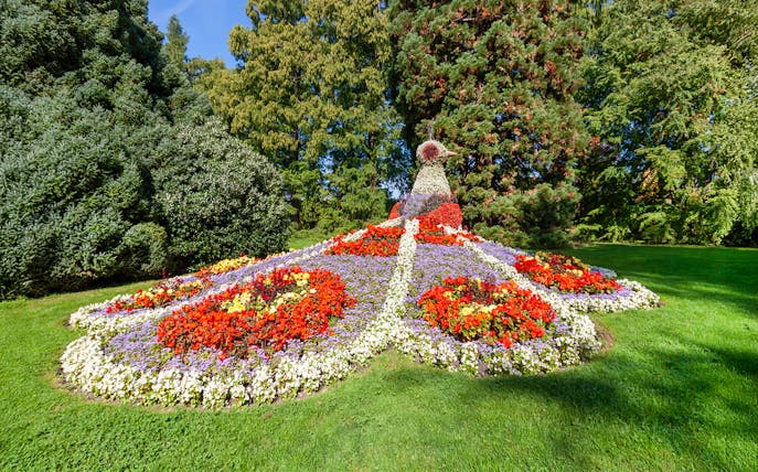 Peacock sculpture made of flowers at Mainau Island garden, Lake Constance.