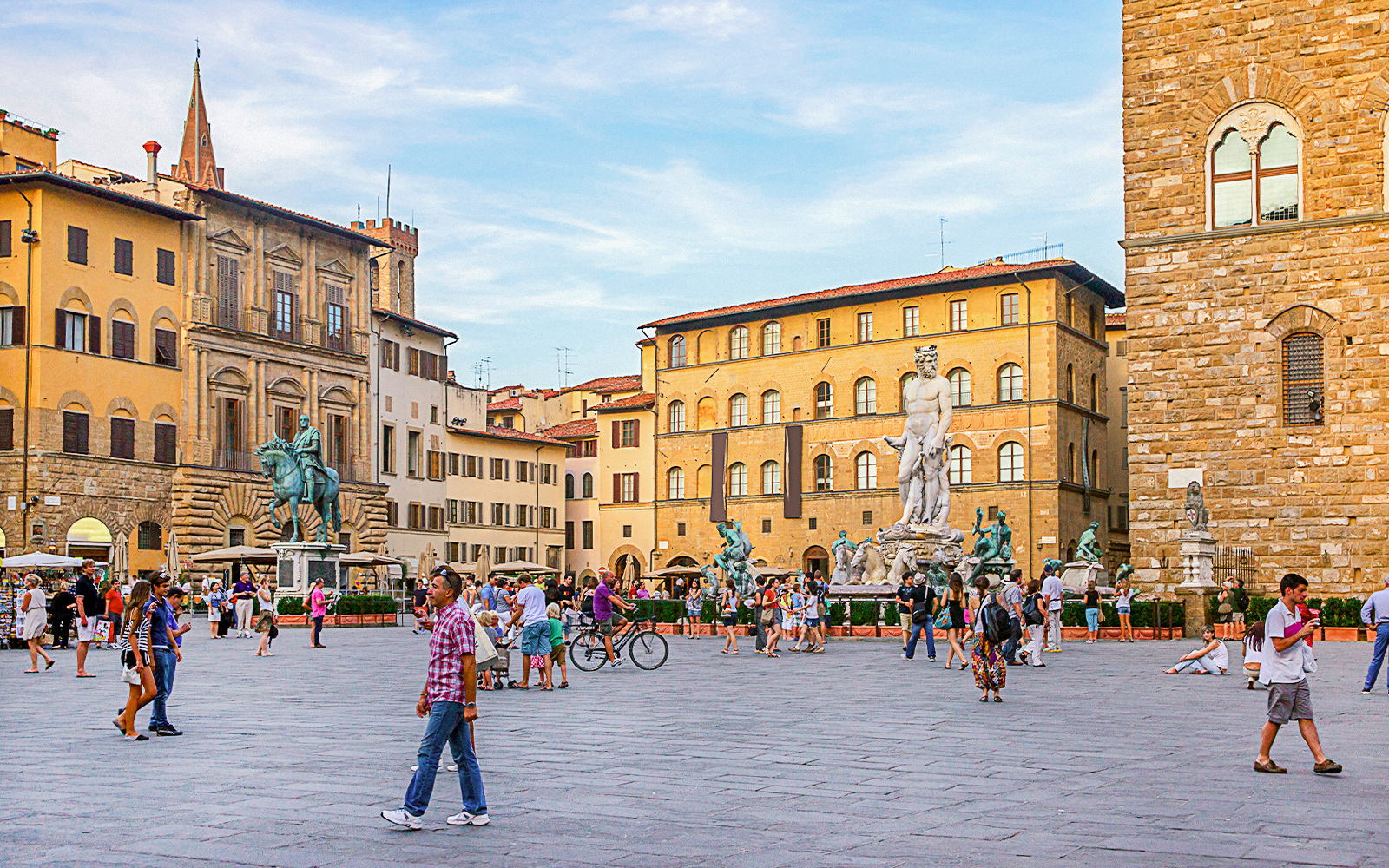 Piazza della Signoria with Neptune Fountain and equestrian statue, Florence, Italy.