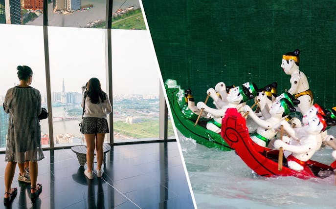 Visitors viewing Ho Chi Minh City skyline from a sky deck, Vietnam.
