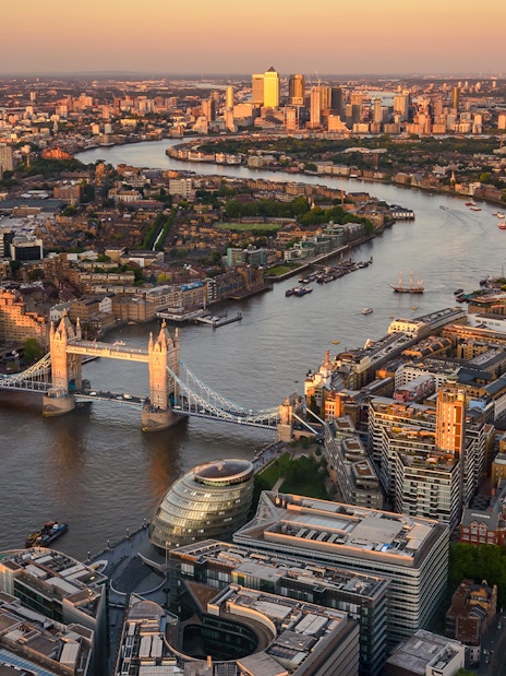 London skyline with Tower Bridge and Thames River at sunset from The Shard.