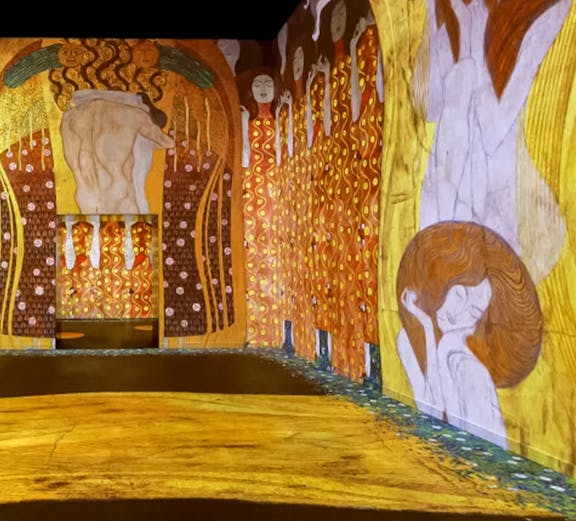 Immersive art installation featuring Gustav Klimt's works in a digital exhibition.