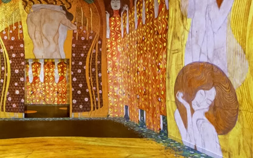 Immersive art installation featuring Gustav Klimt's works in a digital exhibition.