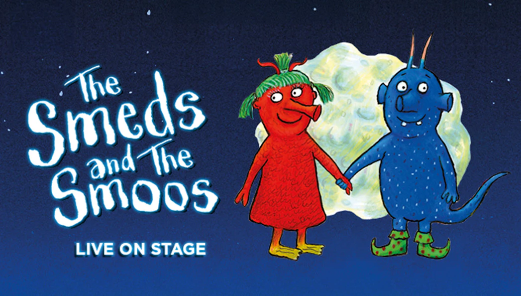 The Smeds and The Smoos characters holding hands on stage.