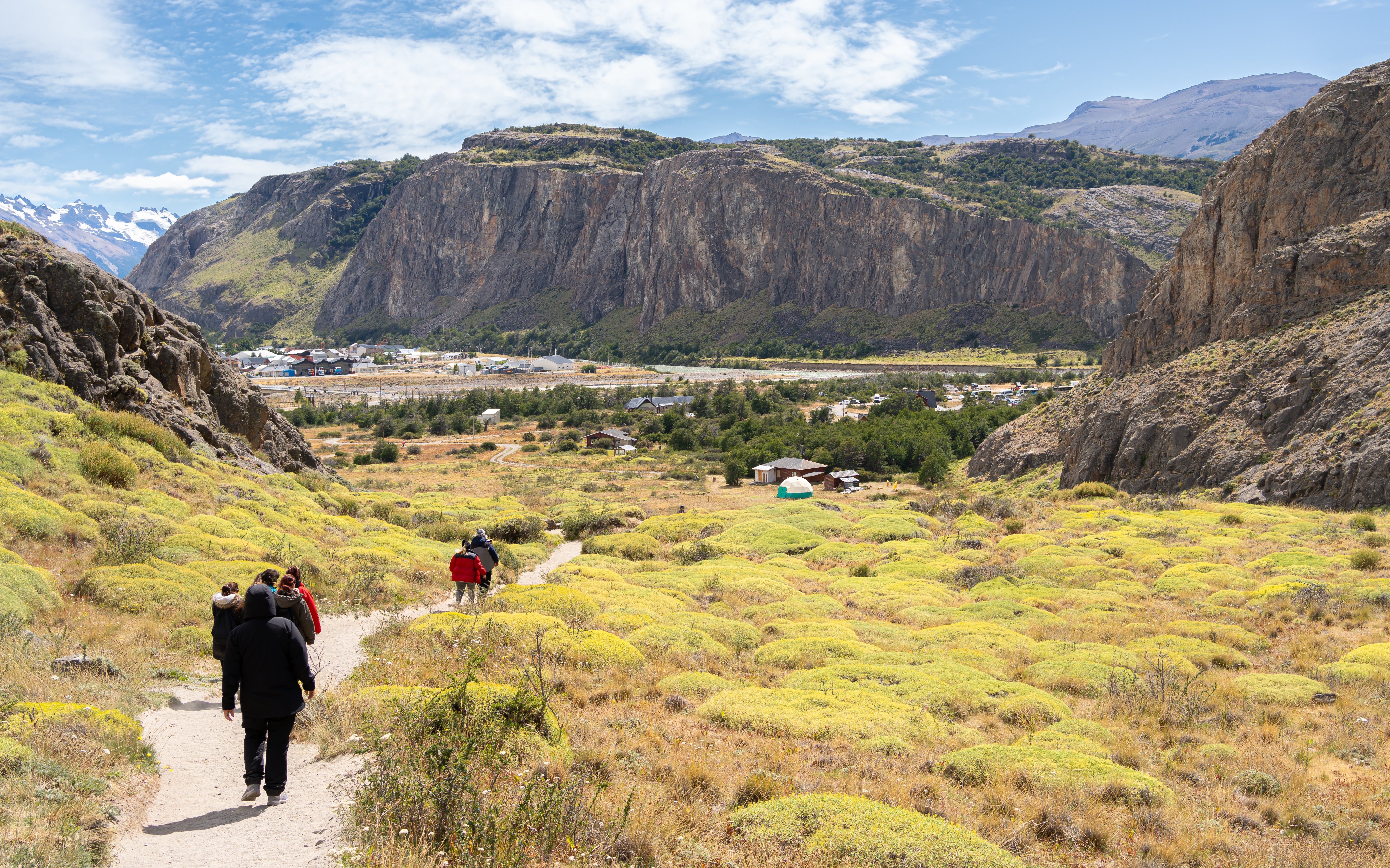 People hiking on Mirador de los Cóndores trail towards El Chaltén, Santa Cruz, Argentina.