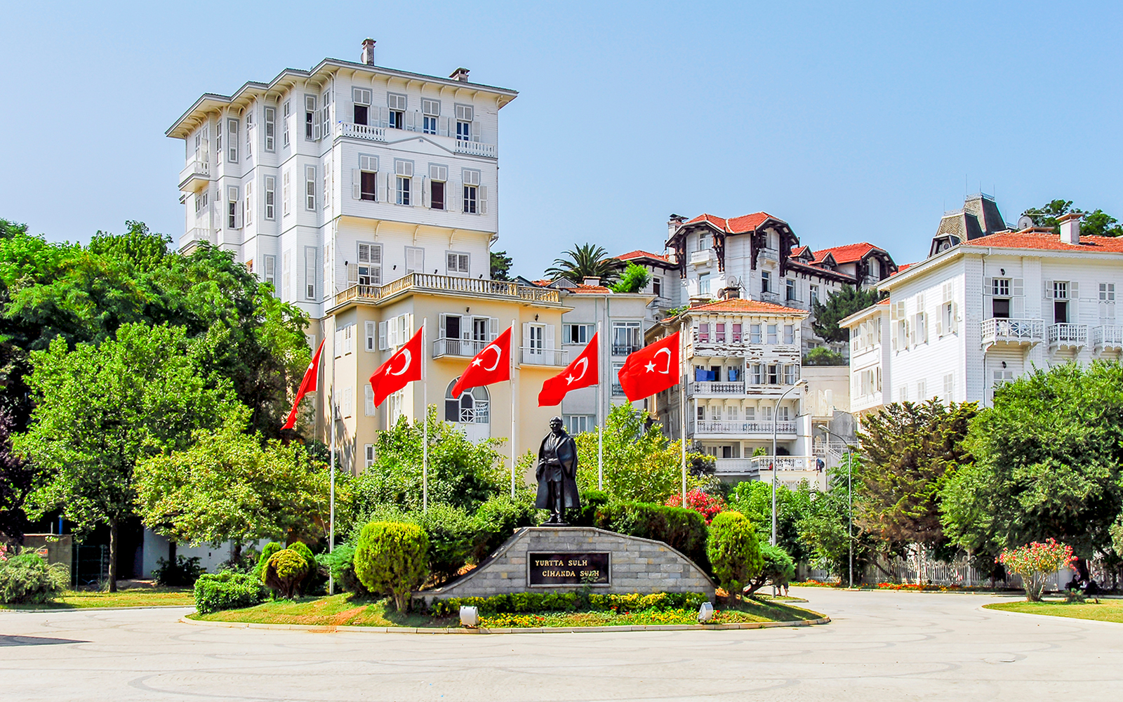 Streets of Princess Island with Turkish flags and historic buildings.