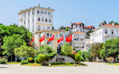 Streets of Princess Island with Turkish flags and historic buildings.