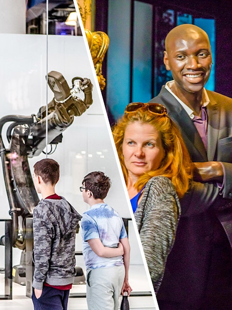 Children observing robotic exhibit at Science & Industry Museum, Paris, France.