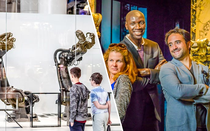 Children observing robotic exhibit at Science & Industry Museum, Paris, France.