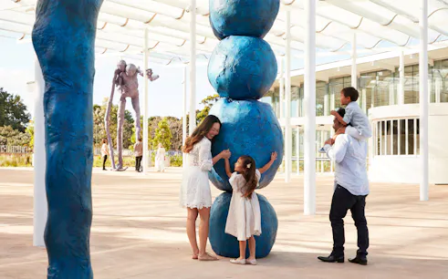 Family interacting with Annie Morris's Stack sculpture at Art Gallery of New South Wales, Sydney.