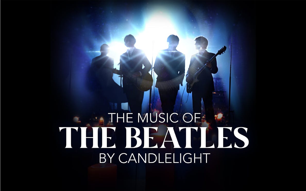 Silhouetted band performing Beatles music by candlelight.
