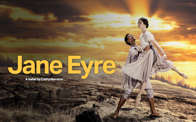 Northern Ballet dancers performing Jane Eyre against a dramatic sunset backdrop.