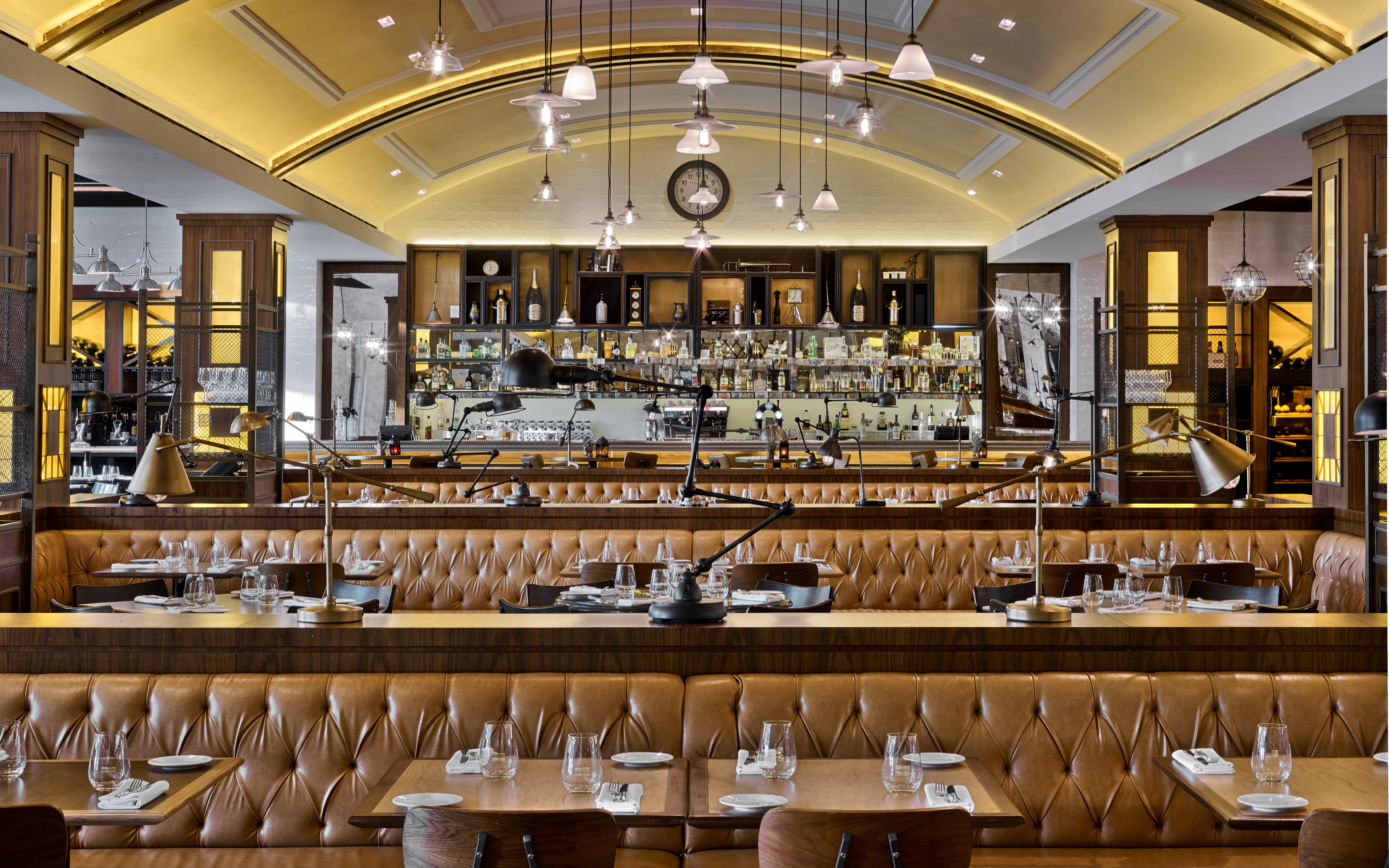 Bread Street Kitchen interior with set tables, Dubai.