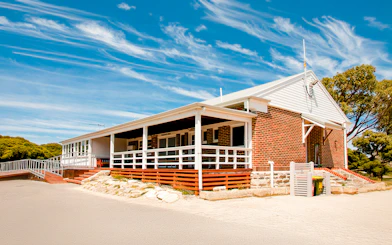 Kingstown Barracks building with red brick and white trim on Rottnest Island, Australia.