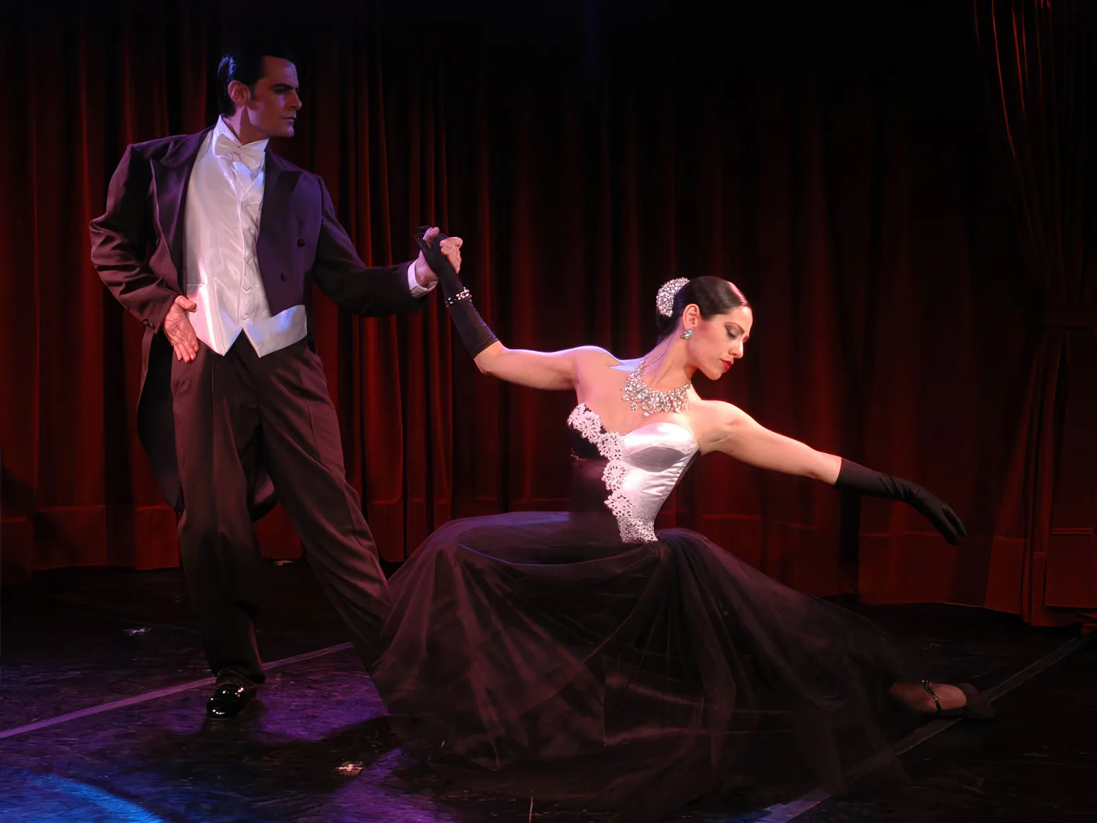 Dancers performing at Rojo Tango Show in Buenos Aires.