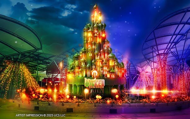 Wicked for Good attraction at Universal Studios Singapore, featuring a vibrant, illuminated castle.