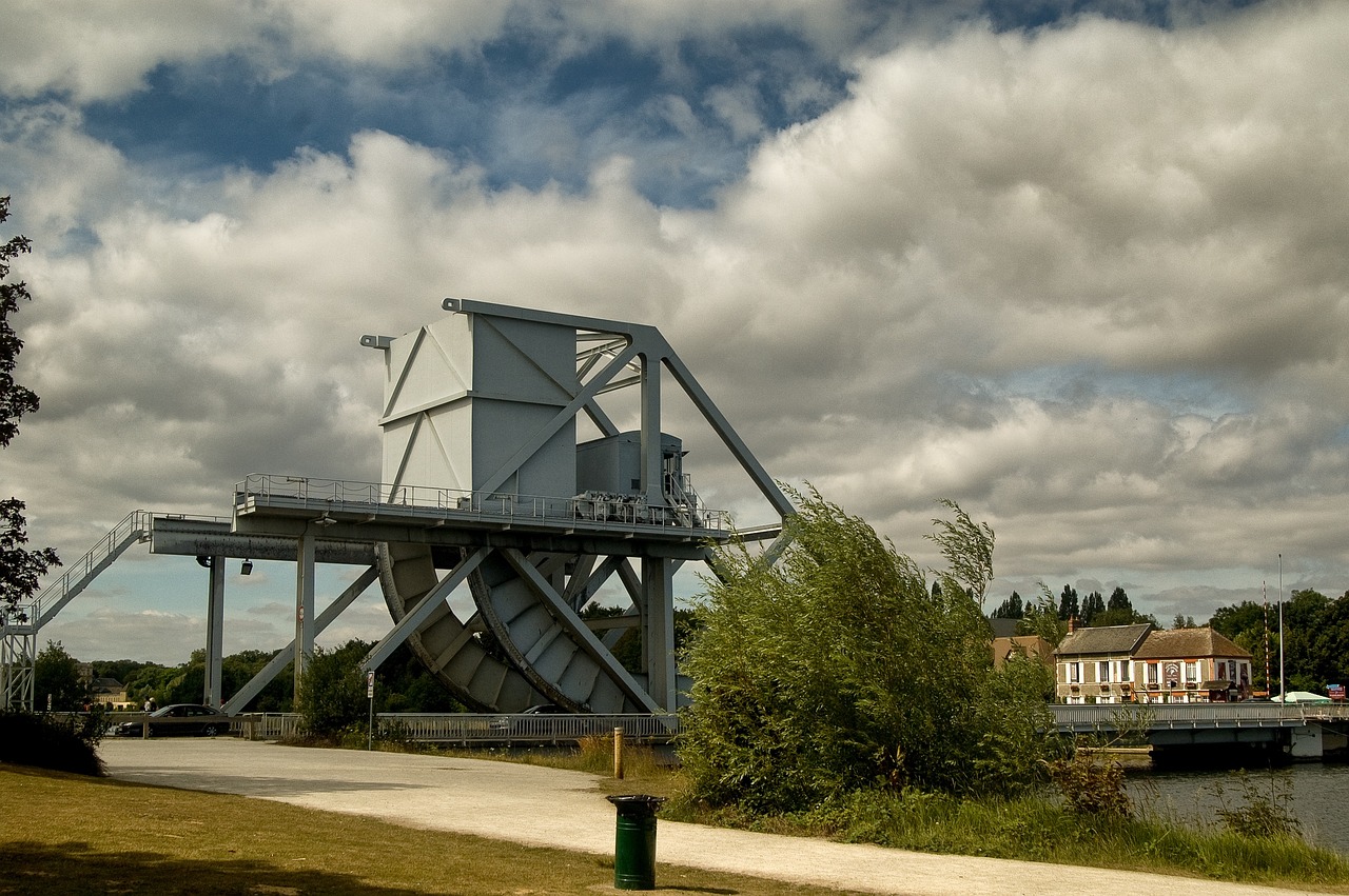 Pegasus Bridge in Normandy with historical significance and surrounding landscape.