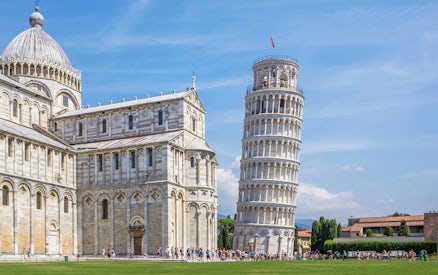 Leaning Tower of Pisa with Pisa Cathedral on the left during a walking tour.