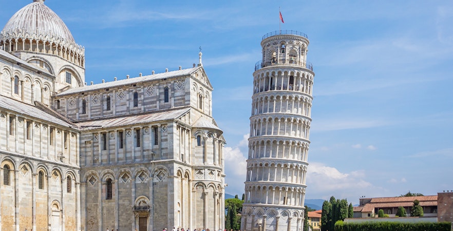Leaning Tower of Pisa with Pisa Cathedral on the left during a walking tour.