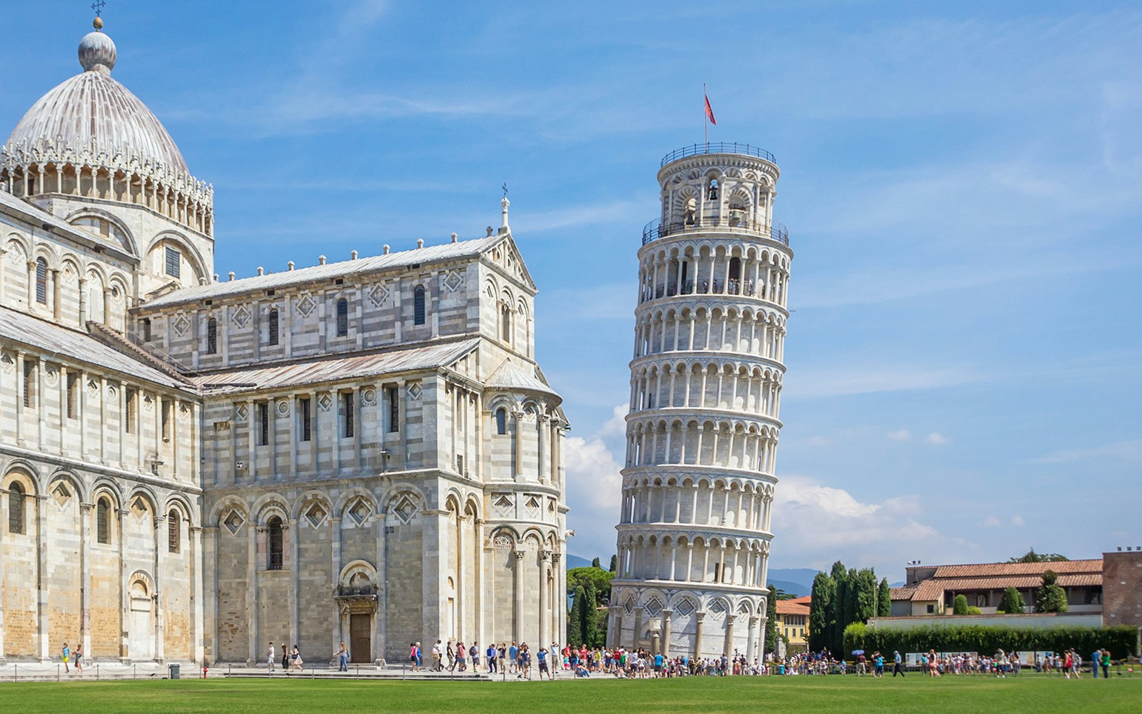 Leaning Tower of Pisa with Pisa Cathedral on the left during a walking tour.